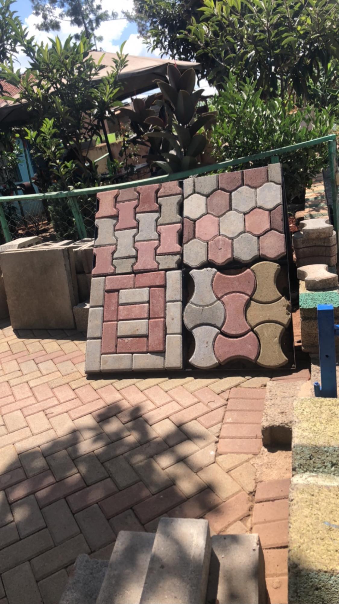 Baran Company Limited product range — interlocking pavers, hexagonal tiles, and concrete blocks